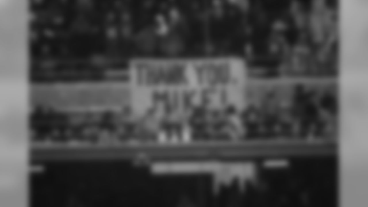 The 12th MAN shows their admiration for Coach Holmgren with a large "Thank You" banner.