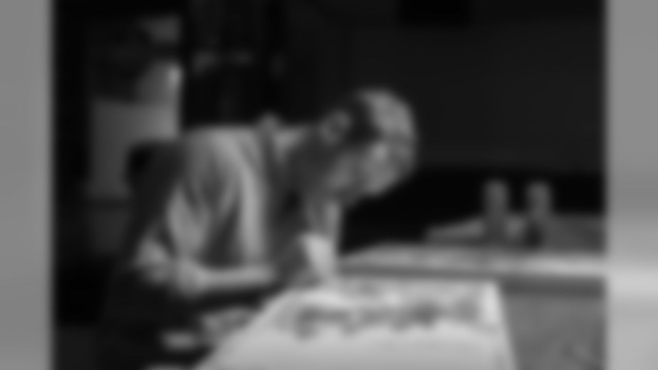 Jon Norquist from Coffee on Canvas (CoffeeOnCanvas.com) creates a piece of artwork for the Seahawks schedule release.