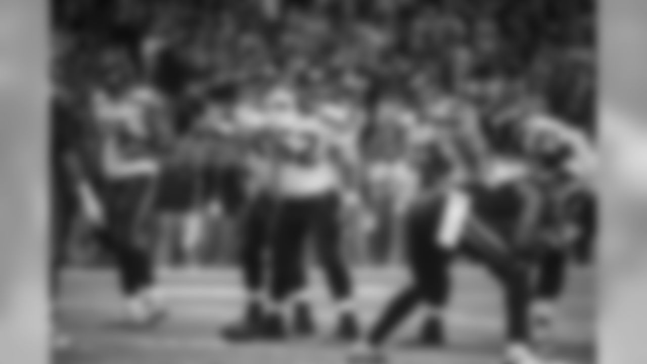 Seattle's newly constructed offensive line communicates during the game. From left are Garry Gilliam, J.R. Sweezy, Drew Nowak, Justin Britt and Russell Okung.