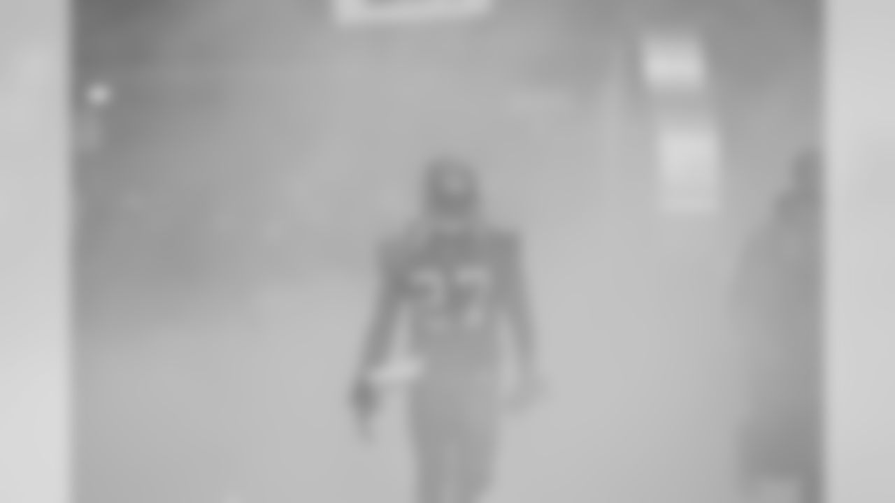 Seattle Seahawks Jordan Babineaux runs onto the field before their NFL football game against the Carolina Panthers, Sunday, Dec. 5, 2010 in Seattle. (AP Photo/Elaine Thompson)