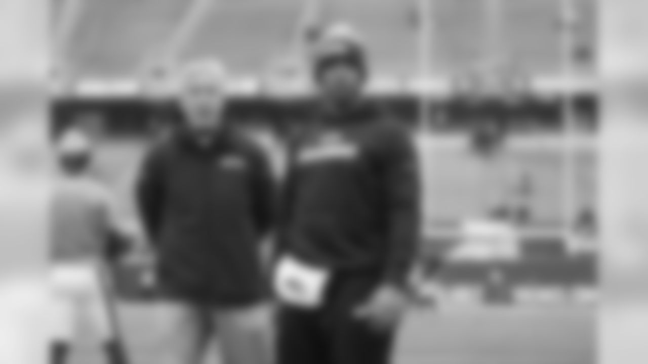 At the stadium, quarterback Russell Wilson and head coach Pete Carroll studied the surroundings during early pregame warmups.