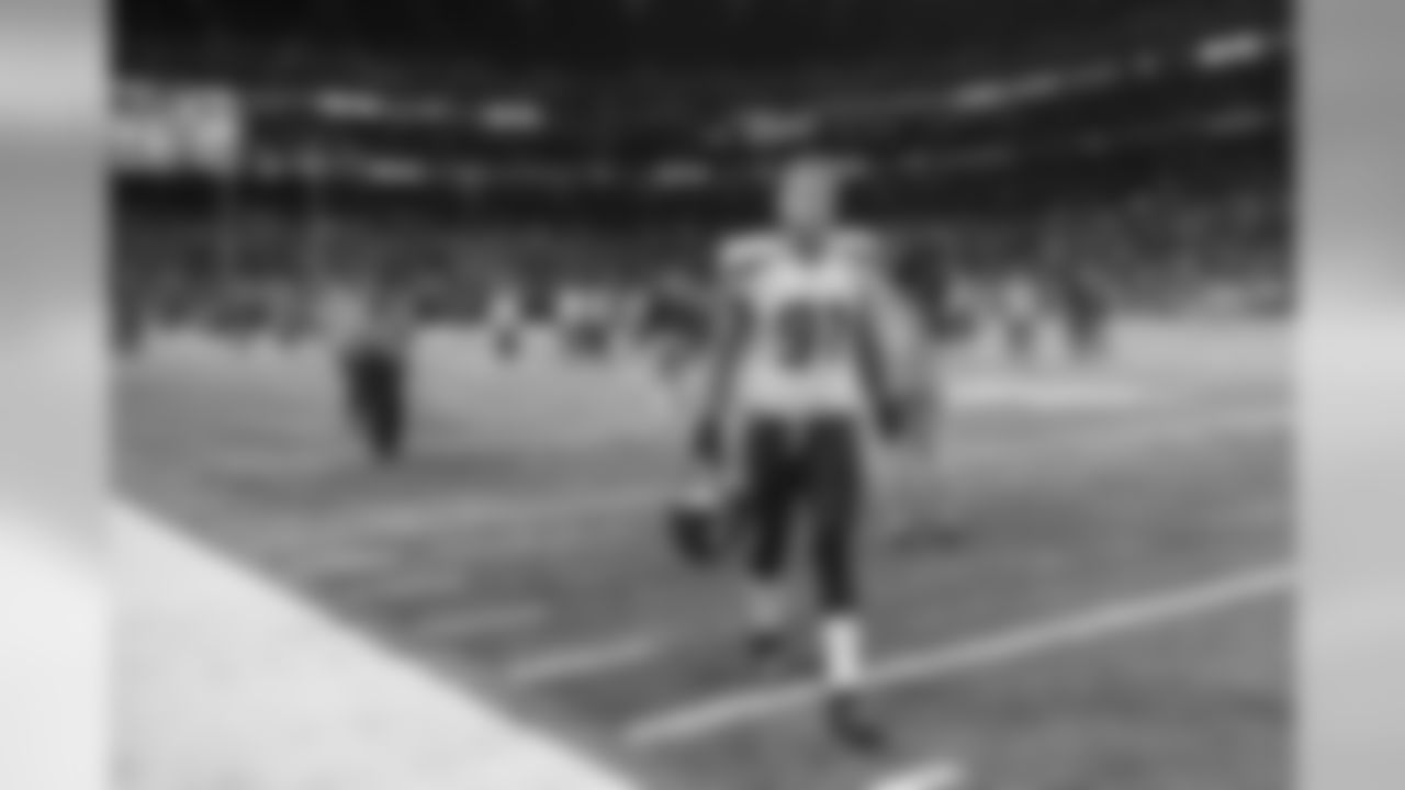 After the overtime loss, Cassius Marsh walks back to the visitors locker room.