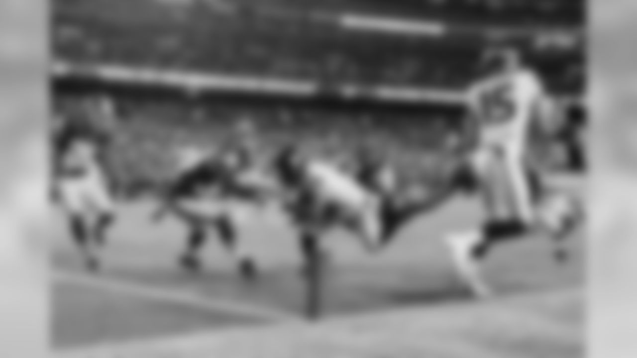 Seattle's Percy Harvin crashes into the end zone with an apparent touchdown that was called back because of a penalty, the first of three times that would happen on Monday night.
