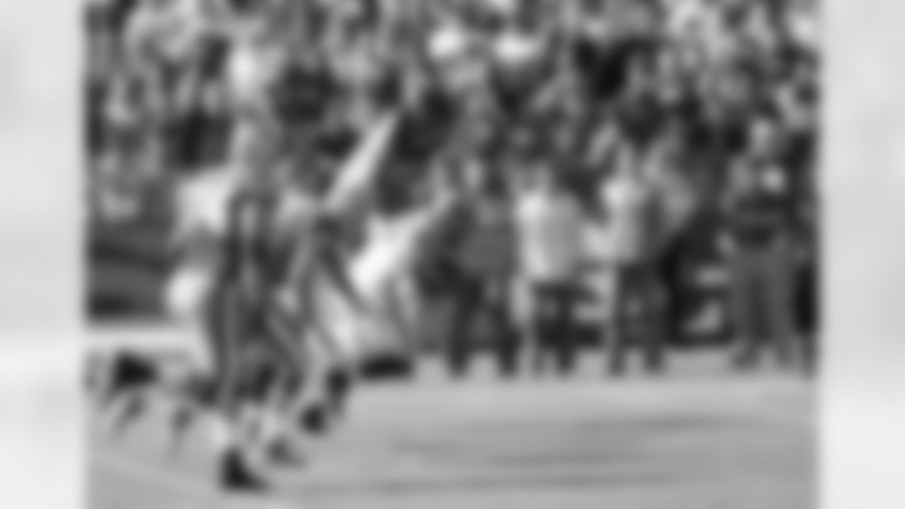 Patrick Kerney picks up a 49er fumble and returns it 50 yards.