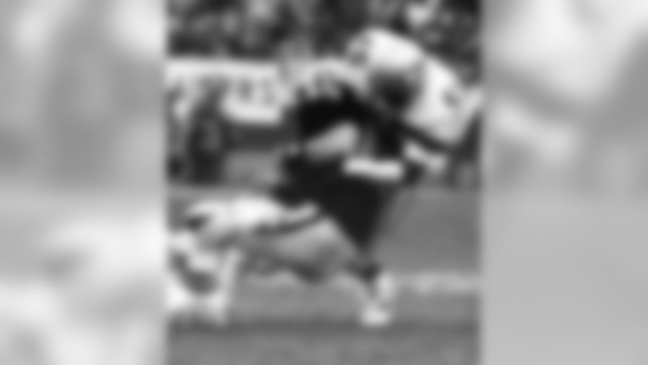 Seattle Seahawks safety Kenny Easley (45) takes down Los Angeles Raiders tight end Todd Christensen (45) in a 30-14 loss to the Los Angeles Raiders in an AFC Championship game on January 8, 1984 at Los Angeles, California. 1983 AFC Championship Game - Seattle Seahawks vs Los Angeles Raiders - January 8, 1984 (AP Photo/NFL Photos)
