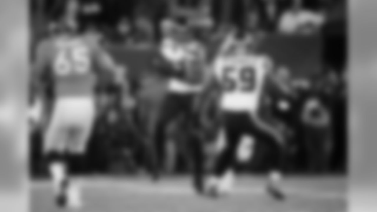 Manning's pass falls short of its intended target and is intercepted by Seattle linebacker Malcolm Smith.
