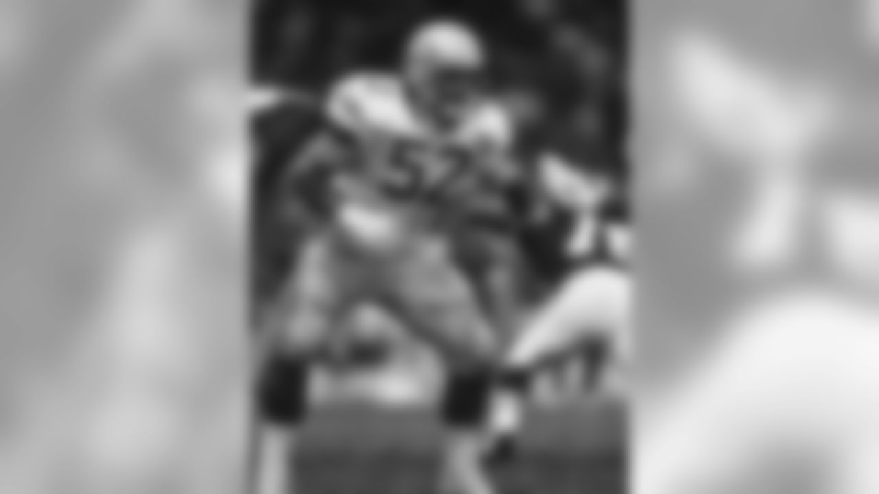 Seattle Seahawks center Kevin Mawae (52) looks to block in a 9 to 35 Seattle Seahawks loss to the Cleveland Browns on December 24, 1994 at Cleveland Municipal Stadium in Cleveland, Ohio. (AP Photo/ Paul Spinelli)