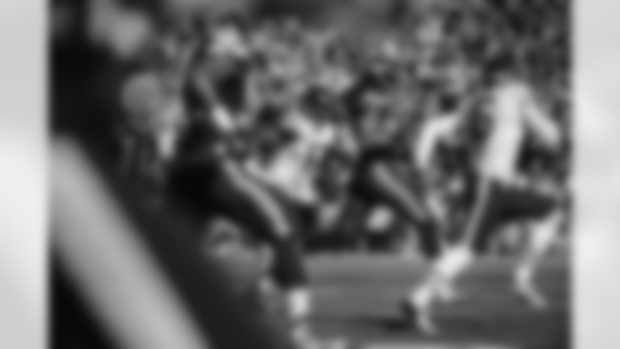 Richard Sherman heads downfield with a 64-yard punt return that led to a Seahawks field goal.