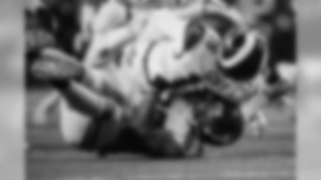 Michael Bennett sacks Rams quarterback Jared Goff.