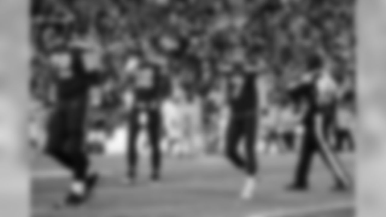 Seahawks kicker Blair Walsh, along with teammates Luke Joeckel and Jimmy Graham, walk off the field after a missed field goal in the fourth quarter.