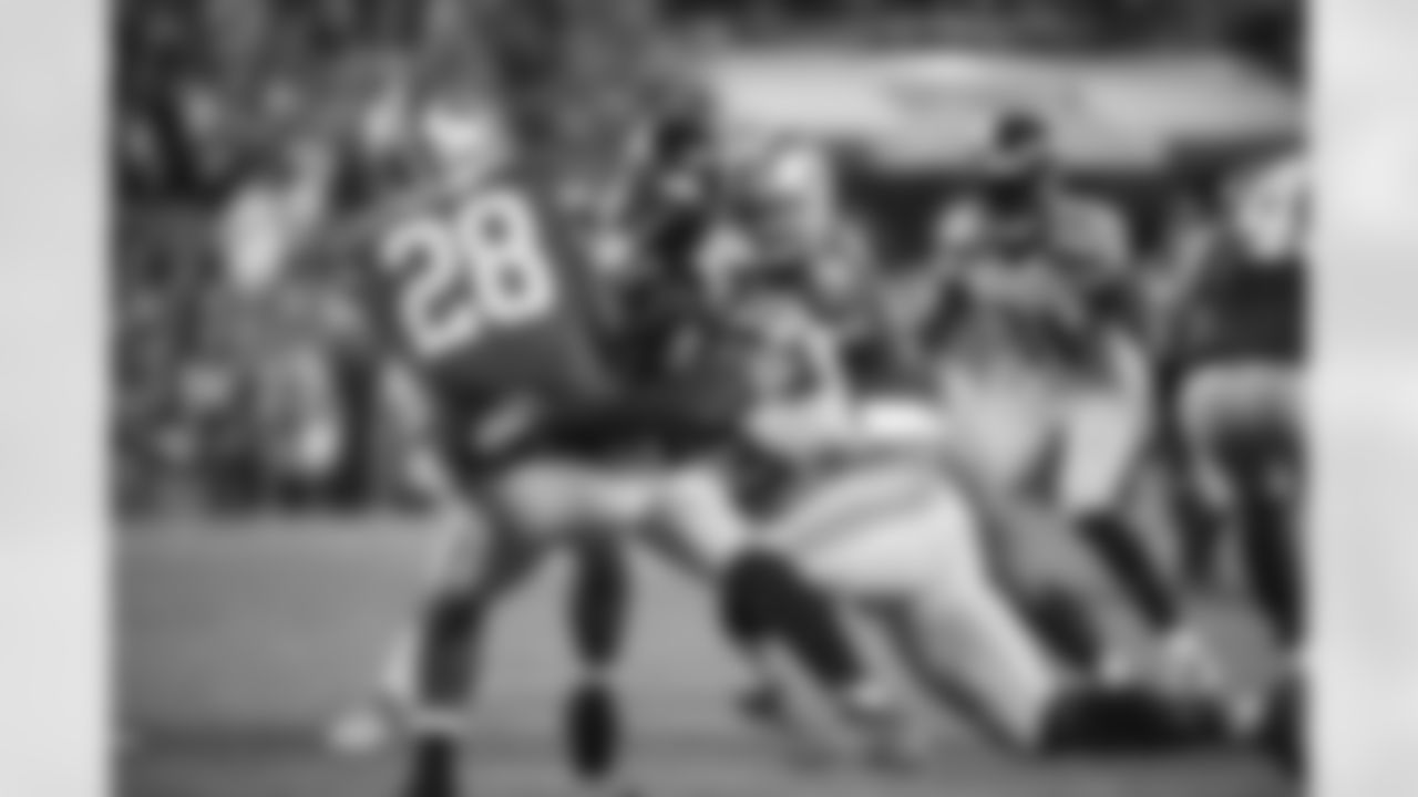 Jeron Johnson tackles San Francisco's Carlos Hyde on the game's opening kickoff, setting the tone for Seattle's defense.