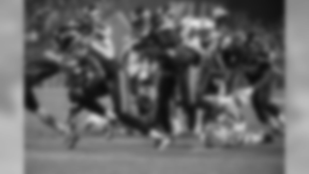 Running back Marshawn Lynch rumbles into the open field during the third quarter. Lynch ran for 102 yards during the game.