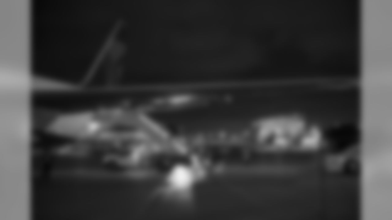 The Seahawks deplane their Delta charter flight in Seattle after winning their second consecutive road game.