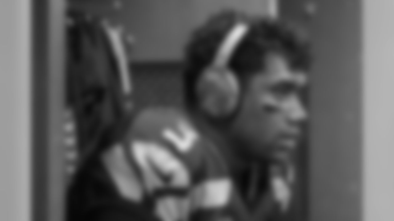 In the locker room, Russell Wilson focused with his Bose headphones in the final moments before the team took the field.