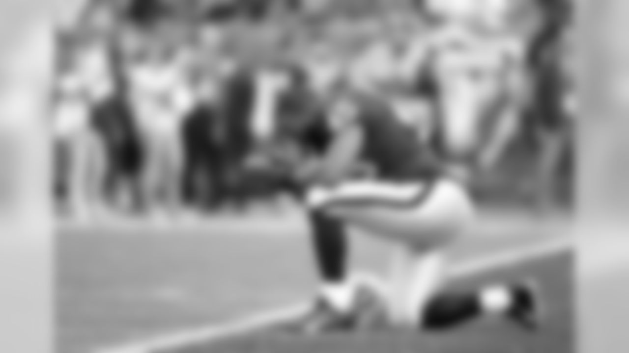 Oakland Raiders running back Marcel Reece (45) prays during an NFL football game against the Philadelphia Eagles on Sunday, Nov. 3, 2013, in Oakland. The Eagles won the game, 49-20. (AP Photo/Greg Trott)