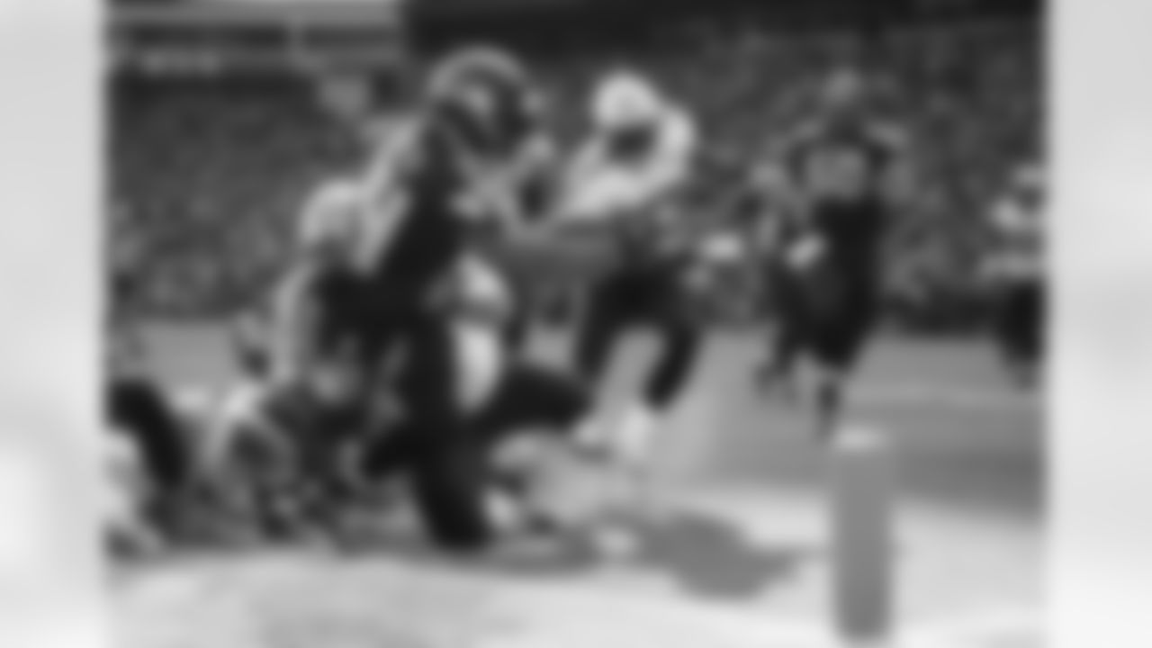 Running back Marshawn Lynch bangs his way towards the end zone in the fourth quarter.