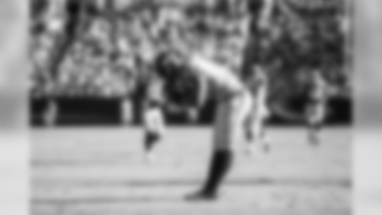 Linebacker Bruce Irvin pays homage to injured teammate Bobby Wagner, performing Wagner's signature bow after sacking Newton.