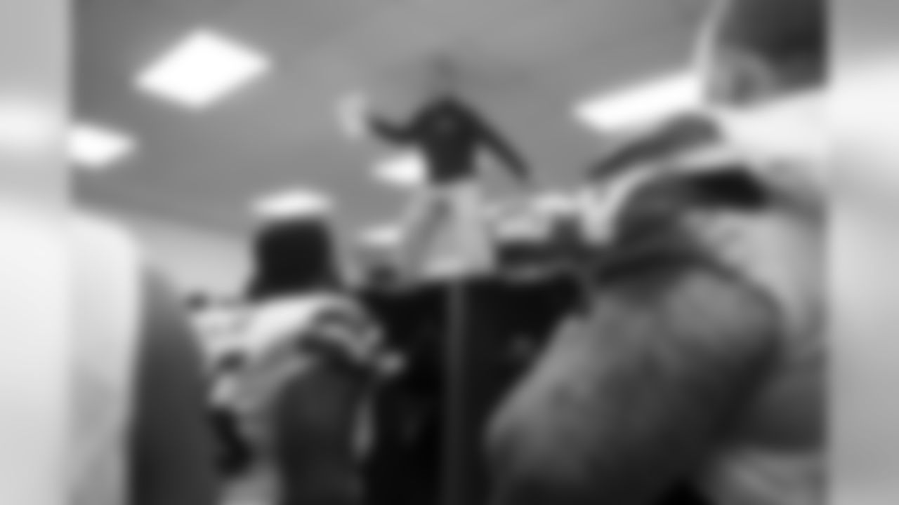 The visitors locker room in Baltimore is divided by a wall of lockers so Seahawks head coach Pete Carroll did the only thing he could in order to be seen by all the players -- he spoke to them from atop the lockers.
