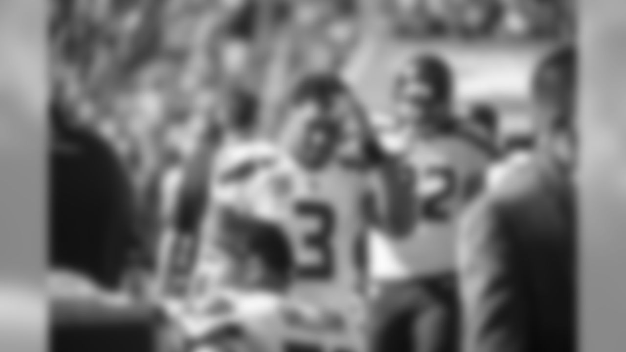 Quarterback Russell Wilson on the sidelines between offensive series.