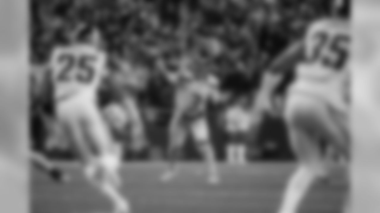 Russell Wilson throws a pass.