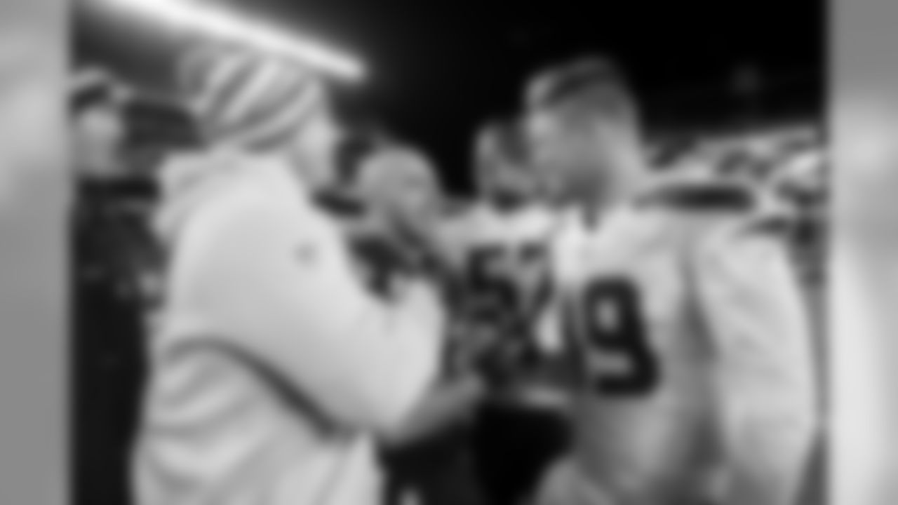 After the game, Seahawks Heath Farwell, Mike Morgan and Clint Gresham greeted former teammate and current Eagles safety Chris Maragos.