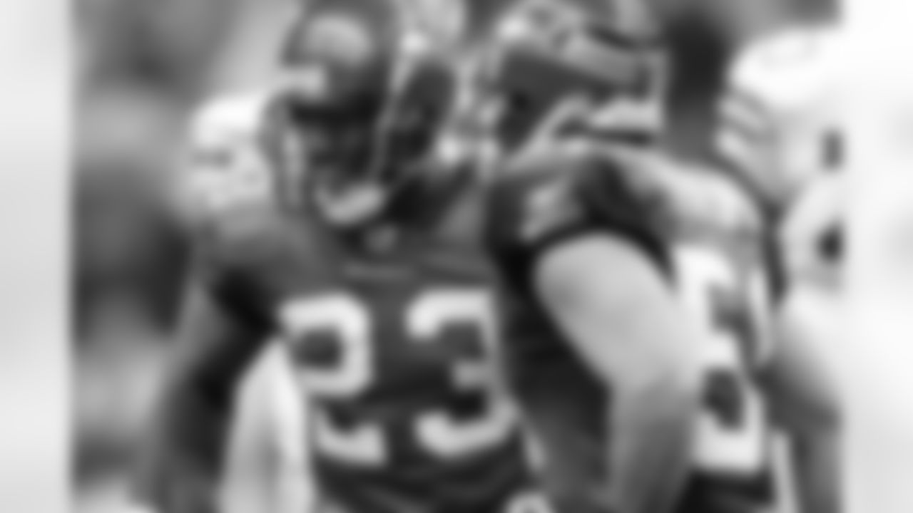 Marcus Trufant and Lofa Tatupu play with a fierce passion for the game.