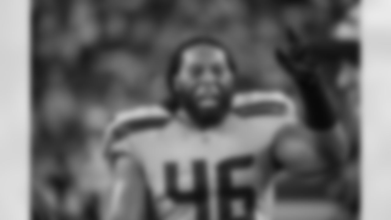 Fullback Will Tukuafu, who played for the 49ers before being released and picked up by the Seahawks, appears to be wishing "Happy Thanksgiving" to his former teammates as the teams stretched during pregame on opposite sides of midfield.