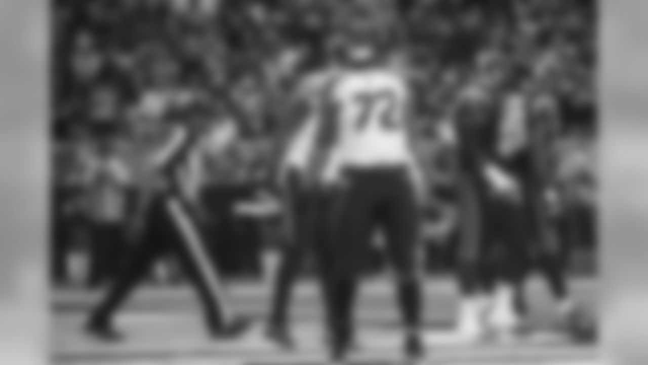 Seahawks defensive end Michael Bennett lets out a yell after his play kept St. Louis pinned near their own end zone in the first quarter.