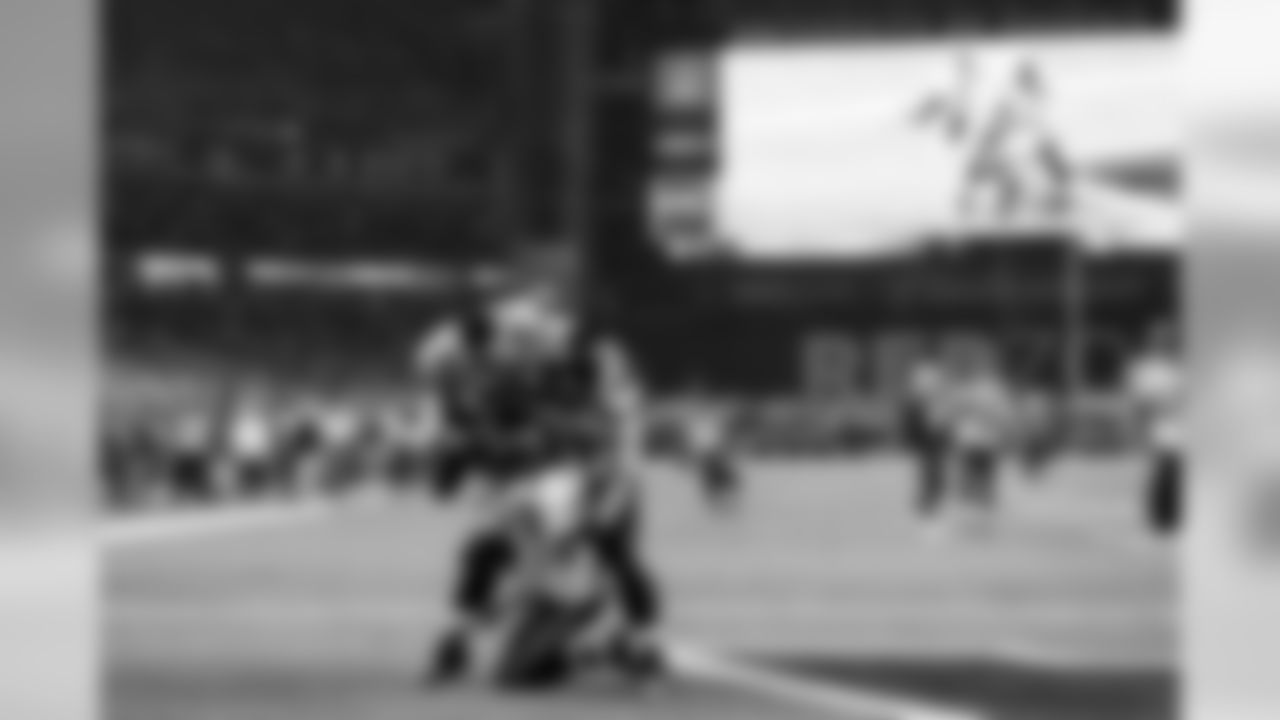 Marshawn Lynch celebrates in the end zone joined by guard Justin Britt, and also Earl Thomas who sprinted 40-yards off the Seahawks sideline to congratulate his teammate.