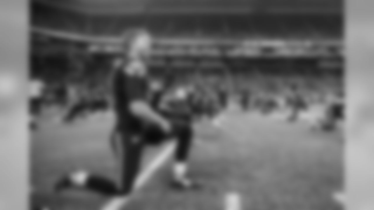 Kicker Steven Hauschka stretches before the game.