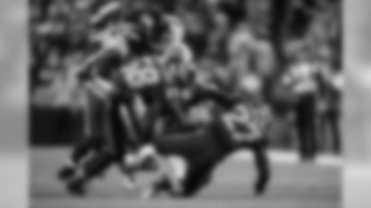 Seattle special teamers Kevin Pierre-Louis and Neiko Thorpe make the play on a punt return by the Bills.