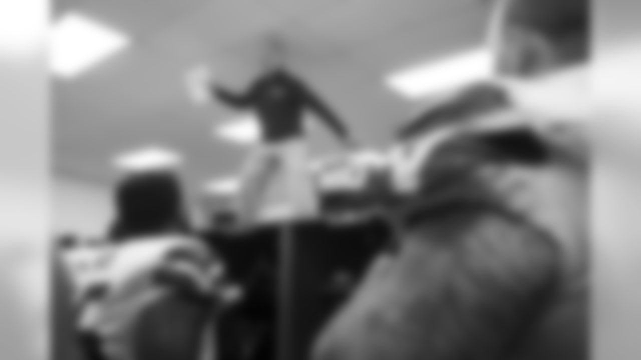 After watching his Seahawks dominate the Baltimore Ravens on the road in a 35-6 victory, head coach Pete Carroll jumped on top of the lockers to make his postgame comments to the team.