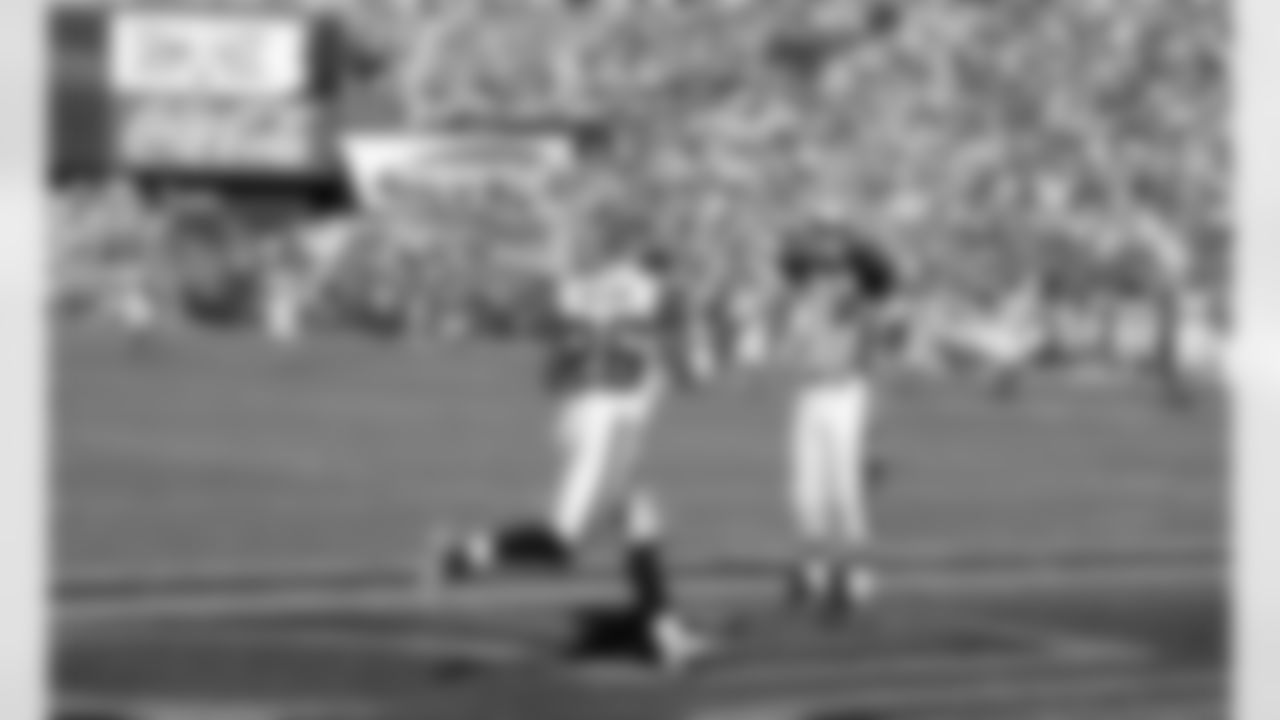 Josh Wilson enters the end zone untouched and alone following a late first-half interception.