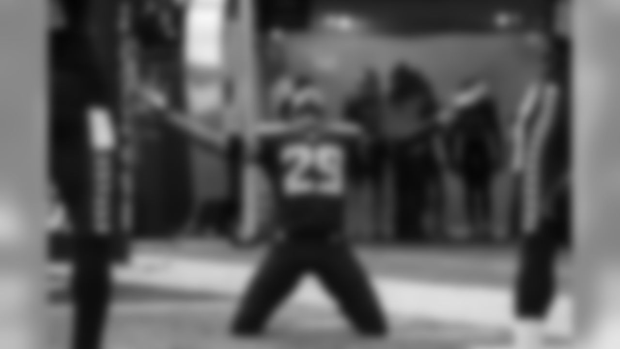 Safety Earl Thomas hits his knees in thanks and lets the roar of the 12's wash over him as he is introduced.