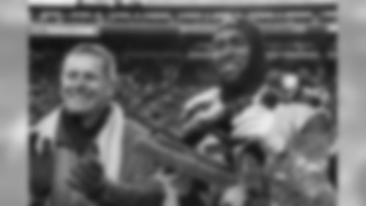 Steve Largent presents the Steve Largent award to Kam Chancellor before the game.