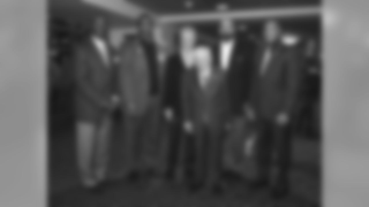 Dan Rooney poses for a photo with John Stallworth, Joe Greene, Art Rooney II, Franco Harris and Lynn Swann during an Alumni dinner at Heinz Field.