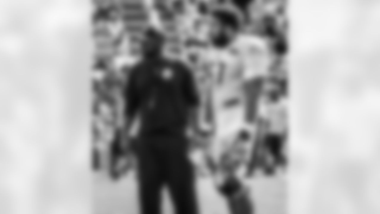 Head Coach Mike Tomlin and Cameron Heyward