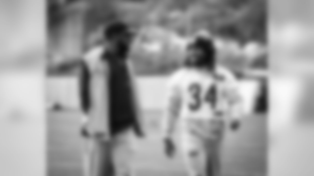 Head coach Mike Tomlin and DeAngelo Williams