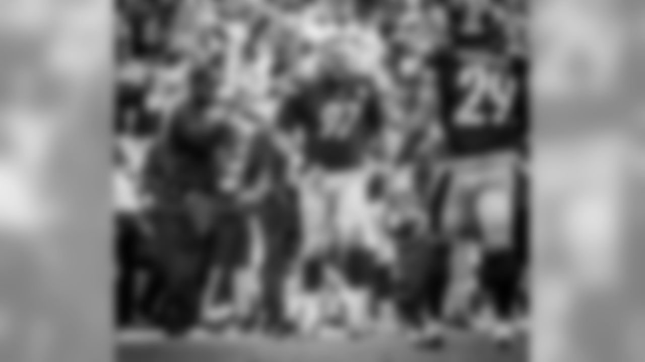 Coach Mike Tomlin and Cameron Heyward