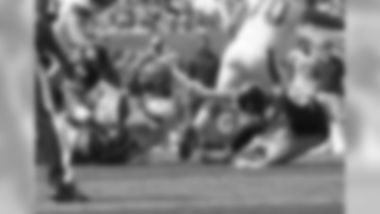 Tyson Alualu, Anthony Chickillo, and T.J. Watt