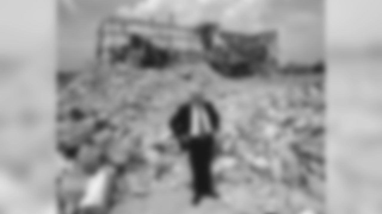 Dan Rooney stands in the rubble of Three Rivers Stadium after it was demolished.