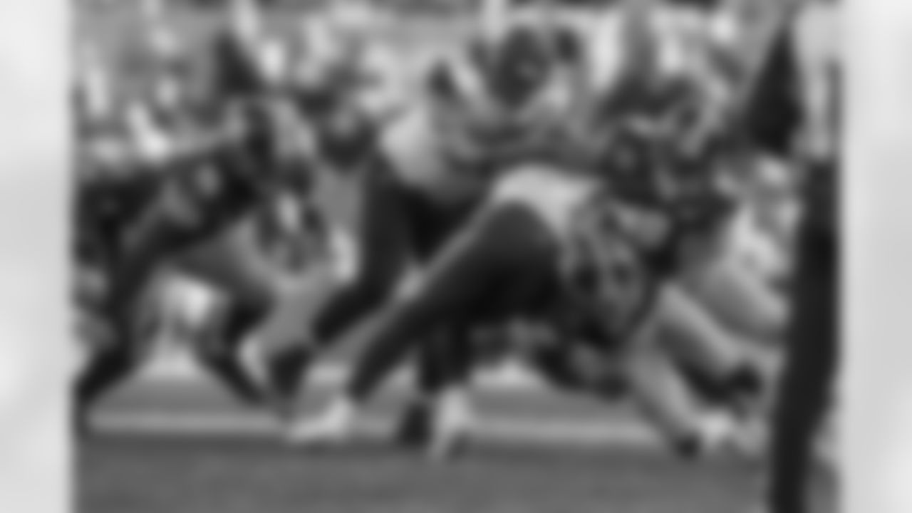 L.T. Walton, Joe Haden, and Vince Williams