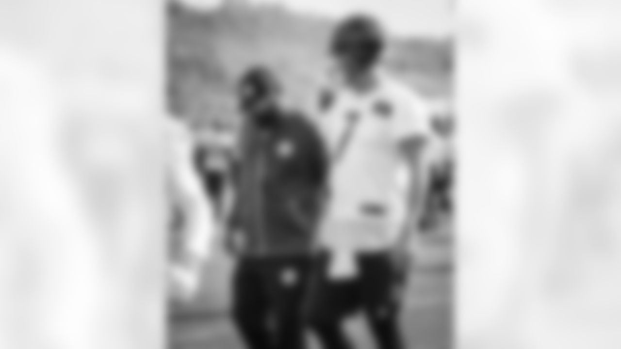 Head coach Mike Tomlin and Ben Roethlisberger
