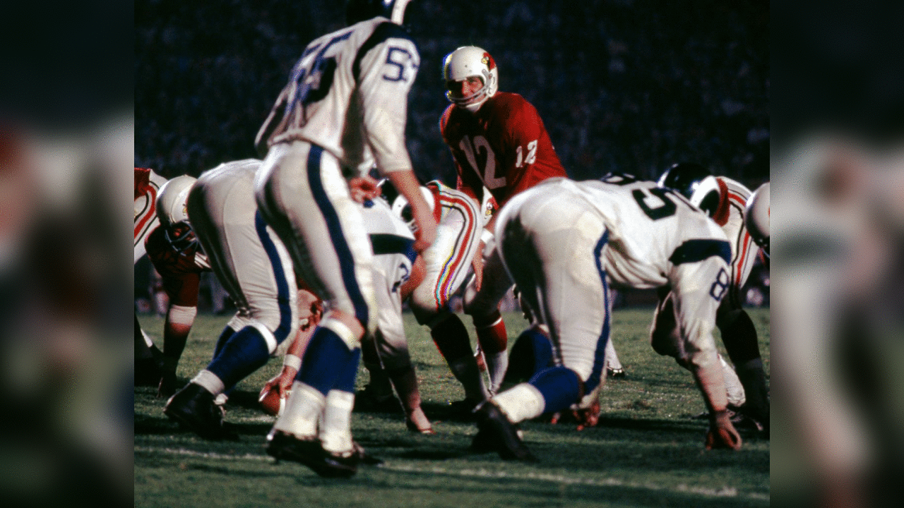 1967: QB Charley Johnson at the line of scrimmage