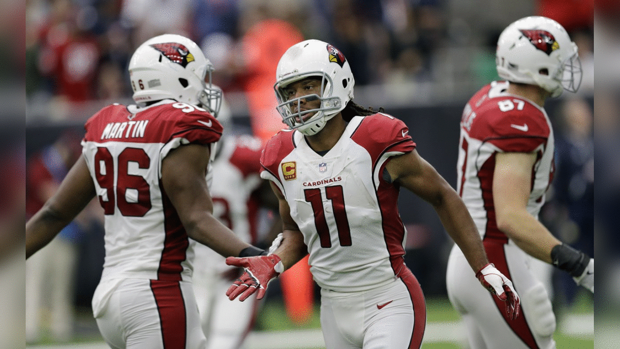 WR Larry Fitzgerald is congratulated after his touchdown reception