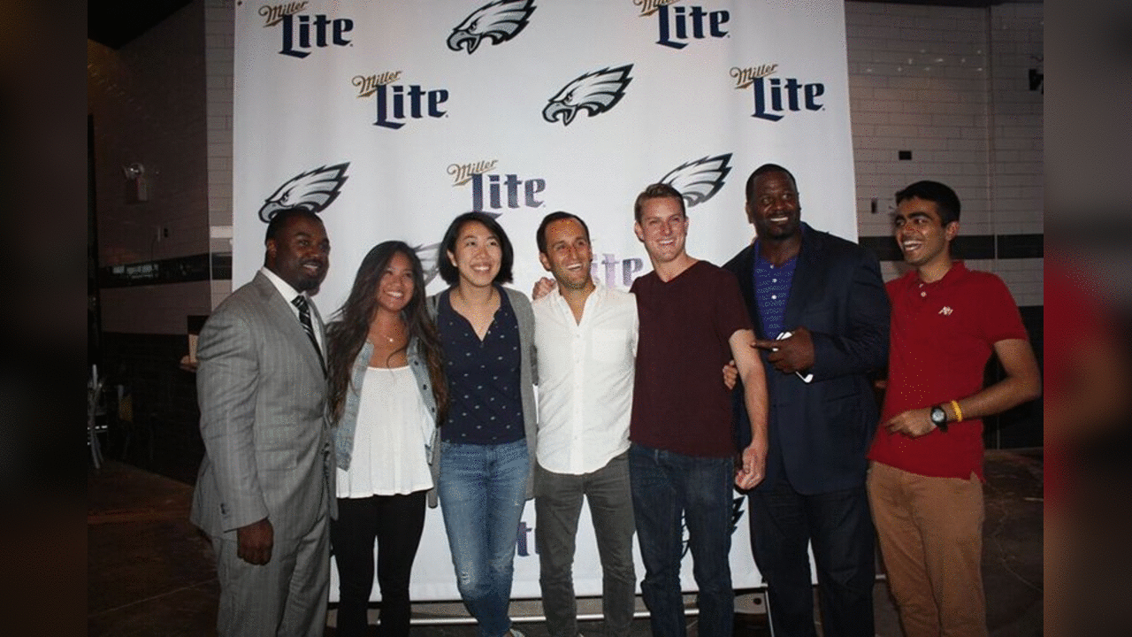 Brian Westbrook and Jeremiah Trotter with fans at Miller Countdown to Kickoff