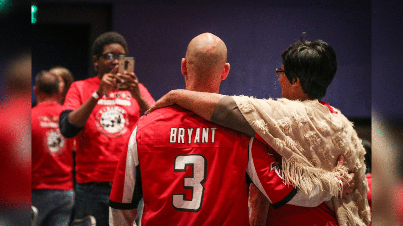 K Matt Bryant hosted 5 families through the Tragedy Assistance Program for Survivors (TAPS) for a day of fun at World of Coca-Cola and the Georgia Aquarium.