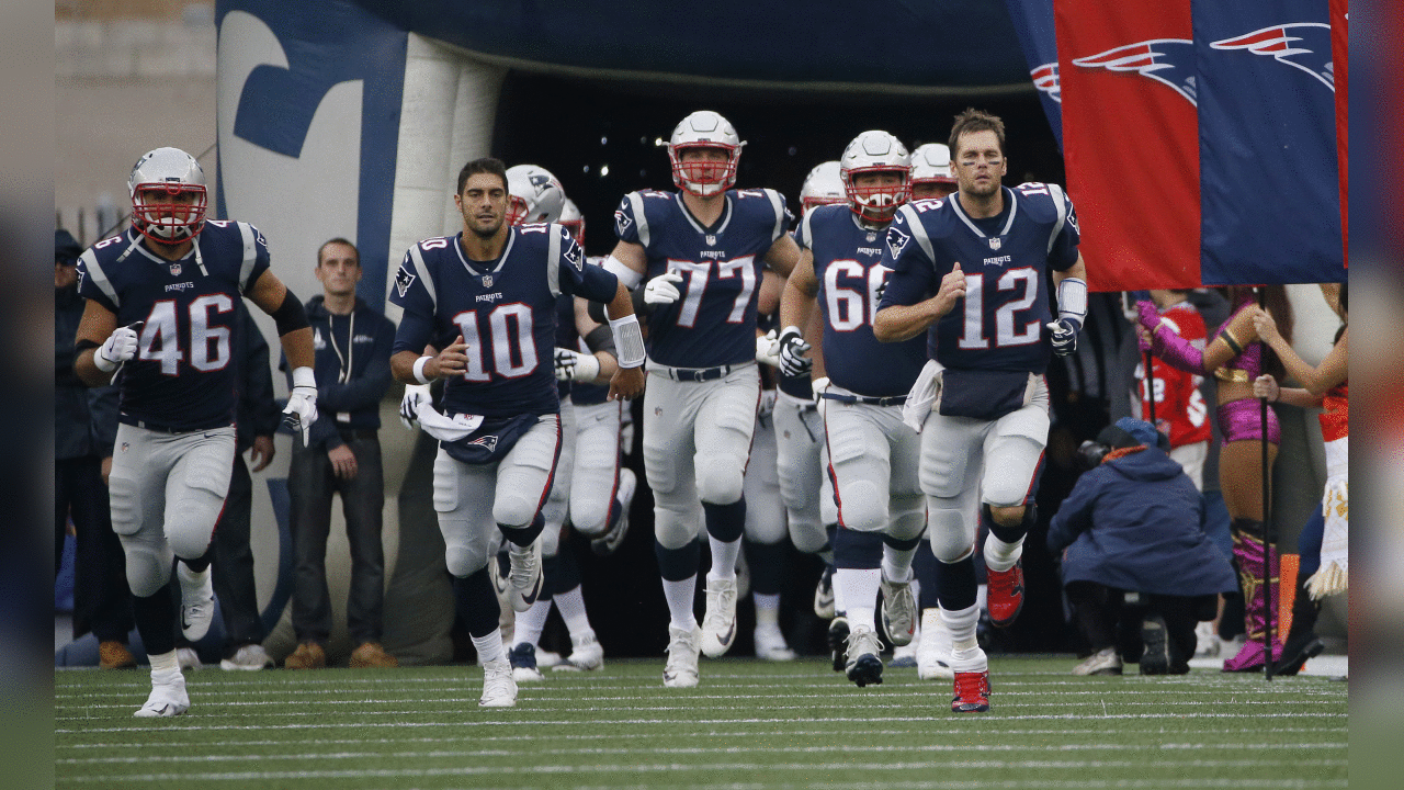 New England Patriots quarterback Tom Brady (12) leads his team onto the field for an NFL football game against the Los Angeles Chargers, Sunday, Oct. 29, 2017, in Foxborough, Mass. (AP Photo/Michael Dwyer)
