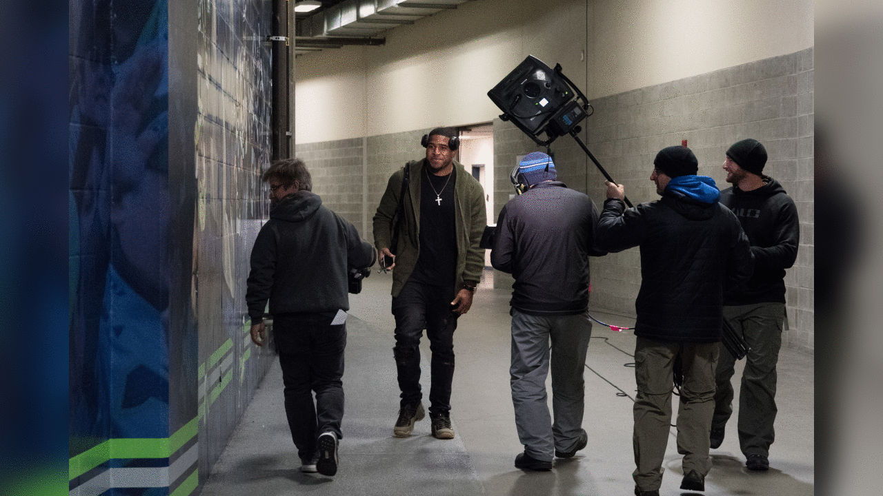 Bobby Wagner arrives at CenturyLink Field trailed by the Thursday Night Football camera crew before the game.