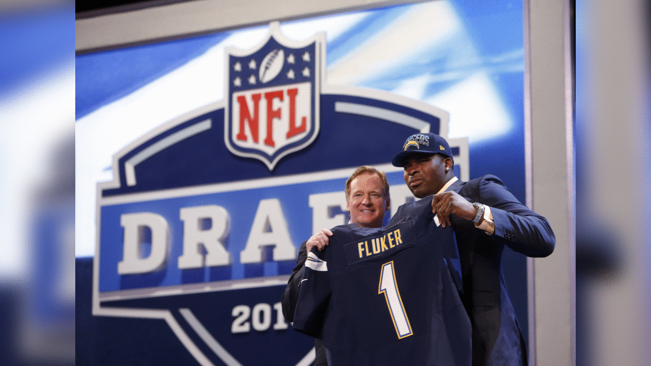 Tackle D.J. Fluker from Alabama stands with NFL commissioner Roger Goodell after being selected 11th overall by the San Diego Chargers in the first round of the NFL football draft, Thursday, April 25, 2013 at Radio City Music Hall in New York. (AP Photo/Jason DeCrow)